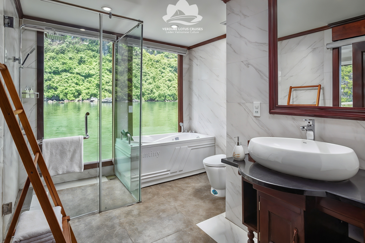 Suite Cabin with Private Balcony and Bathtub on Verdure Lotus Classic Cruise on Lan Ha Bay. Suite Cabin is located on the 2nd floor, 55sqm, bay view with panoramic windows, private balcony, and bathtub.
