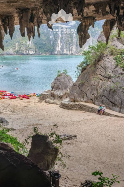 Trinh Nu Cave ( Virgin Cave ) is located in the Northeast of Bo Hon island, about 16 km from Tuan Chau International Marina and 13,5 km from Ha Long International Passenger Port. This is a typical ancient karst ground cave and one of archeological relics of Ha Long culture, dating back 4500 years ago. Currently, to the left of the entrance is a thin sediment layer of about 4m2 beneath a huge rock, including broken shells of cockle, freshwater snails and pieces of pottery mixed with shells of cockles. In front of the entrance, right at the edge of the sea there are many broken pieces of porcelain, which are evidences of an ancient harbor dating back to the 14th – 16th century. The name of the cave is attached to the touching love story of a couple in a fishing village. To keep filial piety and faithful love, the girl petrified. Visiting the cave, tourists will see right at the entrance a horizontal stalagmite, looking like the image of a girl lying with her hair down and reaching her hand out to the sea.